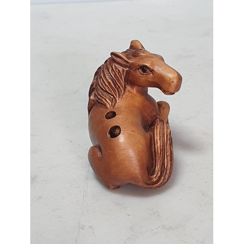 6 - Two carved wood Netsuke one in the form of a Monkey sat on a Horse, the other in the form of a Horse... 