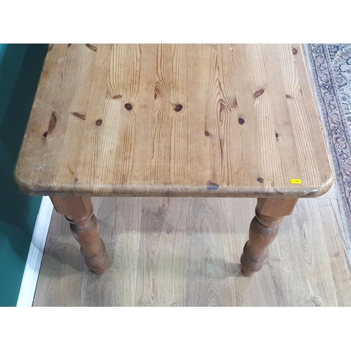 611 - A pine Kitchen Table on turned supports 4ft W x 2ft 7in H (R7)