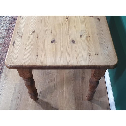 611 - A pine Kitchen Table on turned supports 4ft W x 2ft 7in H (R7)