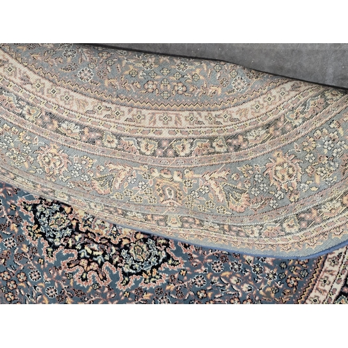 620 - A modern Turkish Rug with multi borders with floral central motif, 6ft 8