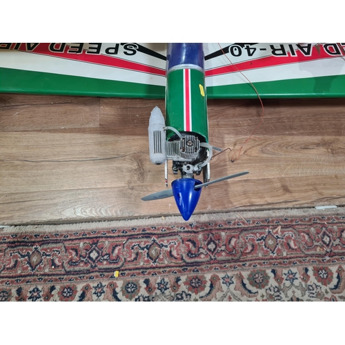 627 - Two petrol driven radio controlled single wing Aircraft complete with servos, an electric Trainer Ai... 