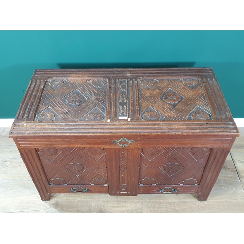 662 - A carved oak two panel Coffer with sunken lid dated 1913 4ft 1in W x 2ft 6in H (R8)