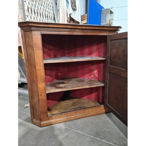 697 - An antique oak hanging Corner Cupboard with panel door 3ft 4in W x 3ft 2in H (R10)