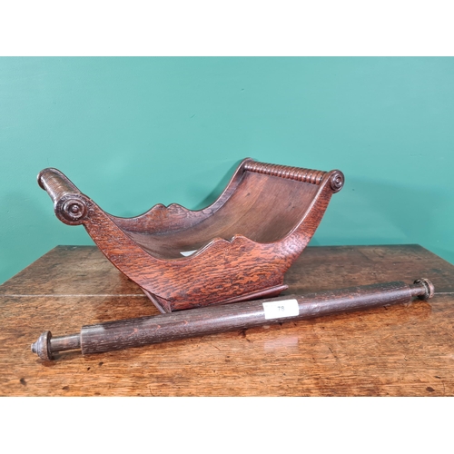 78 - A 19th Century oak Cheese Coaster with shaped frieze, 16 x 10in, and an oak Rolling Pin, 21in (R2)