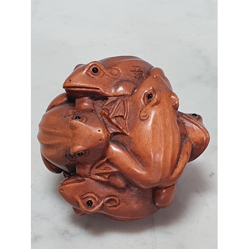 8 - Two carved wood Netsuke in the form of a cluster of Frogs, the other in the form of a Mouse. (Cab).