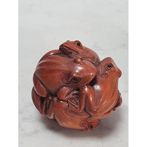 8 - Two carved wood Netsuke in the form of a cluster of Frogs, the other in the form of a Mouse. (Cab).