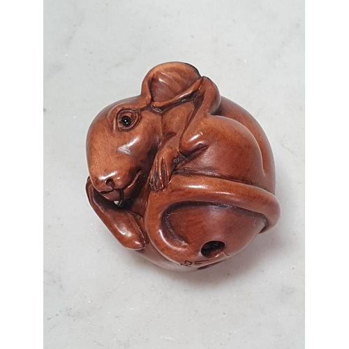 8 - Two carved wood Netsuke in the form of a cluster of Frogs, the other in the form of a Mouse. (Cab).