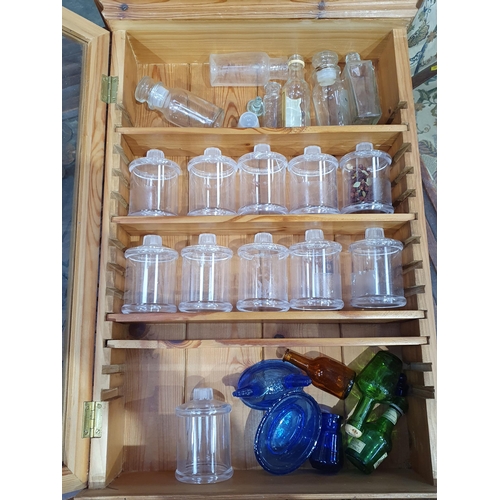 81 - A pine and glazed Wall Cabinet containing various bottles 1ft 9in H x 1ft 2in W (R9)