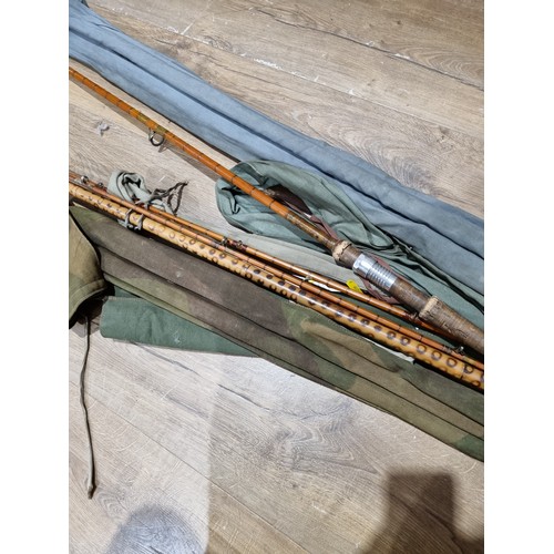 95 - A quantity of Vintage Fishing Rods including, a three piece Hardy 