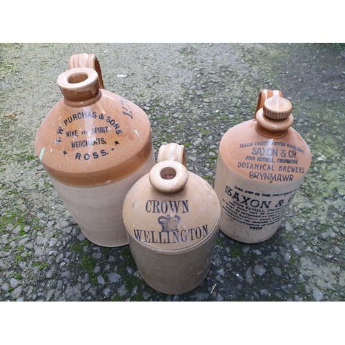 634 - A collection of Stoneware Flagons including Westons Cider and Perry, W.M Pulling and Co Hereford, Cr... 