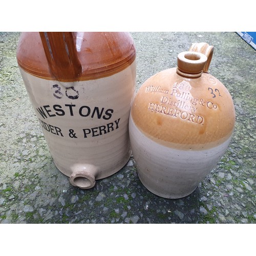 634 - A collection of Stoneware Flagons including Westons Cider and Perry, W.M Pulling and Co Hereford, Cr... 