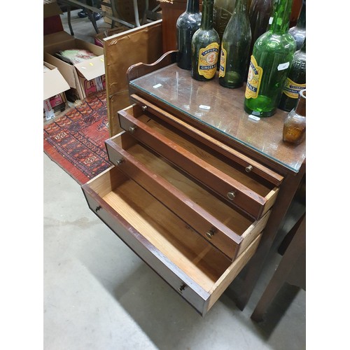 226 - A pair of mahogany tray top Bedside Chests fitted three drawers raised on square cut supports 2ft 4i... 