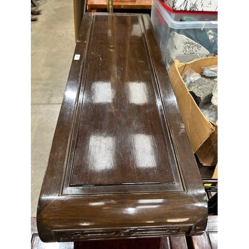 245 - A Chinese hardwood Altar Table with scrolled ends and moulded square supports, 3ft 7in W x 2ft 8in H... 