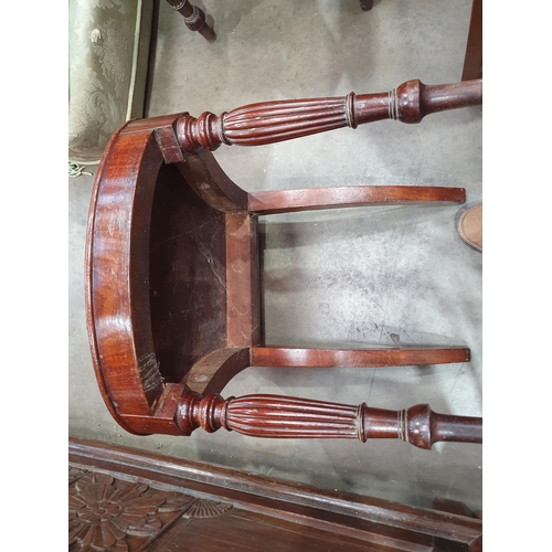 546 - A pair of Victorian mahogany Hall Chairs with carved backs and an Edwardian Elbow Chair with satinwo... 