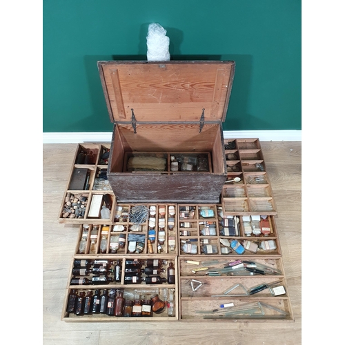 526 - An antique stained pine Chemist's Box containing fitted trays of bottles 2ft 1in W x 1ft 4in H (R7)