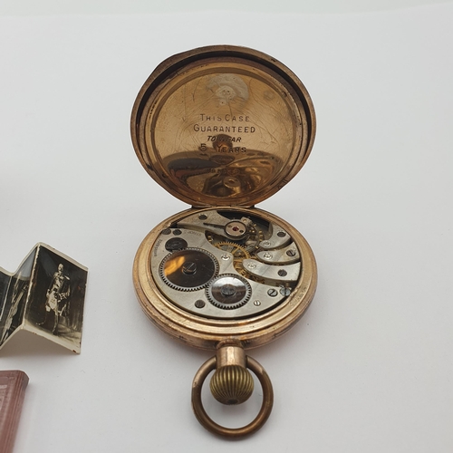 258 - An early 20th century Pocket Watch in gold-plated case, the white enamelled dial having Roman numera... 