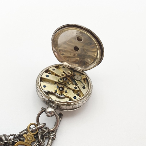 263 - A continental silver Lady's Fob Watch having cream enamel dial with Roman numerals and applied gold ... 