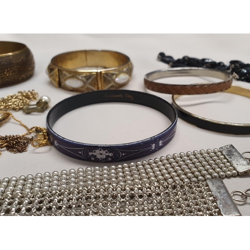 265 - A collection of costume jewellery including a Michaela Frey Bangle