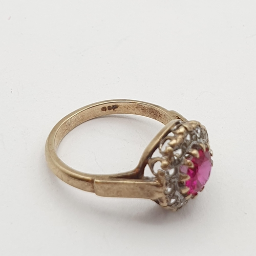 267 - A synthetic Ruby & White Stone (spinel) Ring, claw-set round mixed-cut synthetic ruby surrounded by ... 