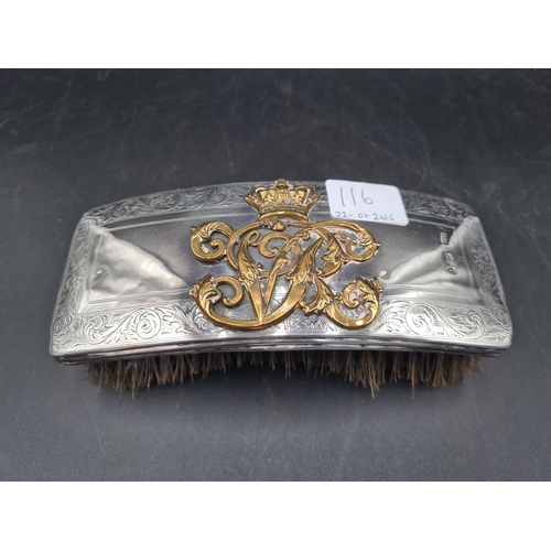 116 - A Victorian silver mounted large Brush with applied gilt crowned initials, London 1890