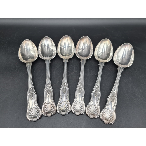 119 - Six plated Table Spoons king's pattern and a fiddle pattern Sauce Ladle