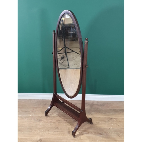 12 - An early 20th century Robing Mirror with oval bevelled plate on cheval frame, 4ft 6in (R6)