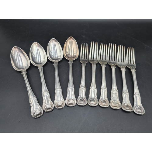 121 - Six 19th Century silver Dinner Forks and four Table Spoons hour glass pattern, various dates, 1050gm... 