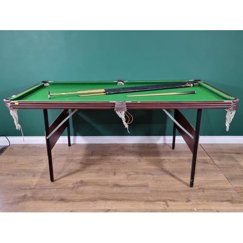 22 - A Pool Table with folding legs