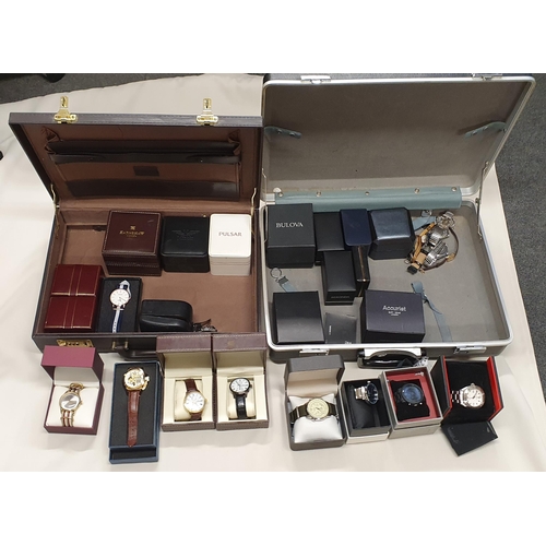 270 - Two briefcases containing a collection of modern mostly quartz gentleman's Wristwatches