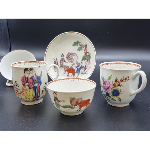 311 - Three famille rose Coffee Cans painted figures and flowers, a Tea Bowl (chipped) and a Tea Bowl and ... 