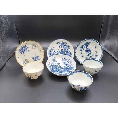 313 - Three Worcester blue and white Saucers, a blue and gilt Saucer and Tea Bowl and two other Tea Bowls ... 