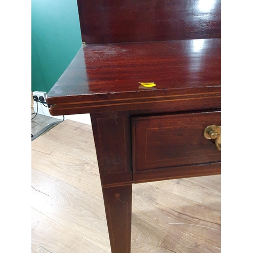 32 - A 19th century mahogany Tea Table with rectangular fold-over top above frieze drawer on square taper... 