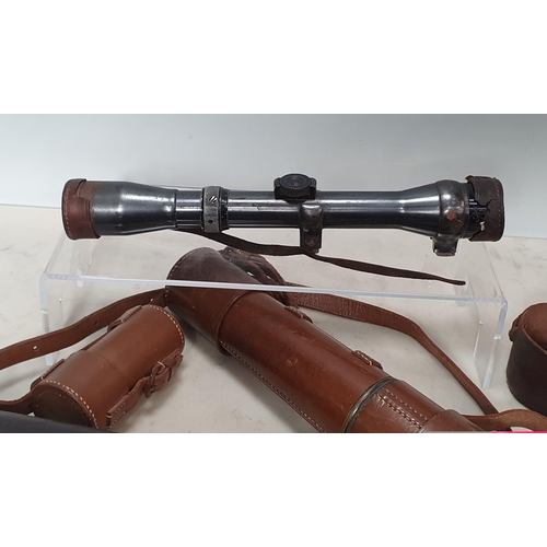 320 - A small Telescope by Parker Hale in a leather case and a German Sight by Wetzler in a leather case