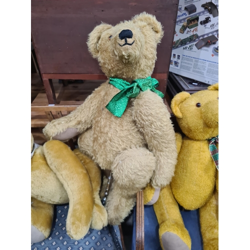 40 - Four large Display Teddy Bears, one on a stand and the other three with fittings for a stand (R2)