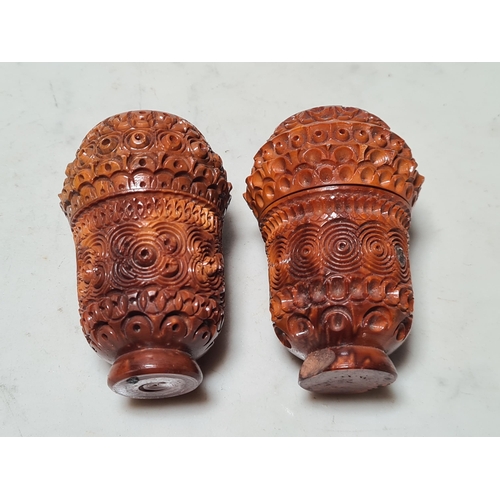 41 - Two carved Coquila Nuts, a treen Pin Cushion and a wooden Pencil Case with painted Landscape decorat... 