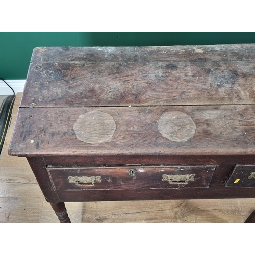 488 - An antique oak Dresser Base with three piece top above three fitted drawers on three turned front su... 