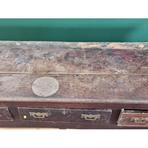 488 - An antique oak Dresser Base with three piece top above three fitted drawers on three turned front su... 