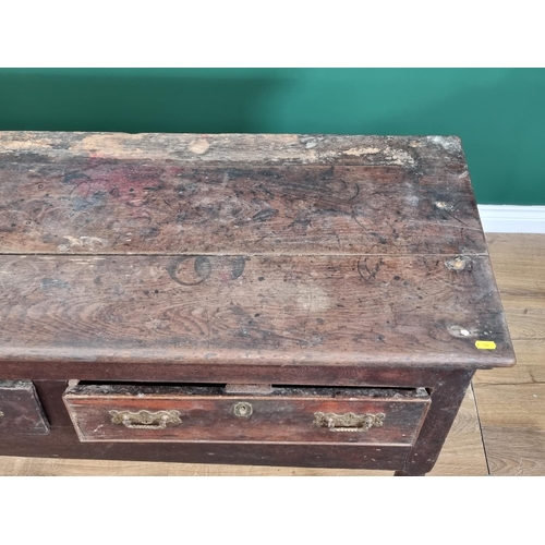 488 - An antique oak Dresser Base with three piece top above three fitted drawers on three turned front su... 