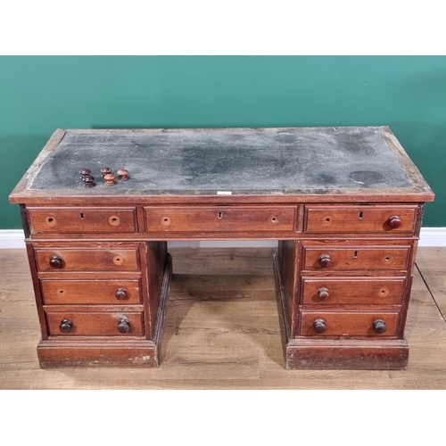 489 - A 19th Century pitch pine Pedestal Desk with inset top and fitted nine drawers on plinth bases, 4ft ... 