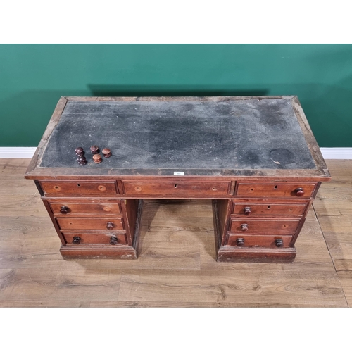 489 - A 19th Century pitch pine Pedestal Desk with inset top and fitted nine drawers on plinth bases, 4ft ... 