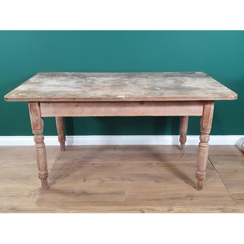 496 - A pine Kitchen Table with single fitted drawer and raised on turned supports, 2ft 6in High x 5ft Lon... 