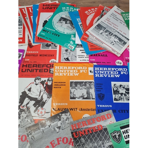 50 - A collection of Football Programmes mainly Hereford United FC, three Hereford United Coffee Mugs and... 