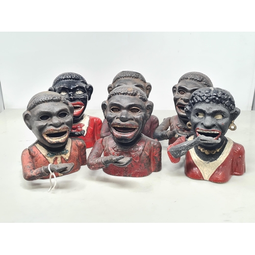 508 - Five assorted cast figural Money Boxes, four with red coats and one female figure all with red coats