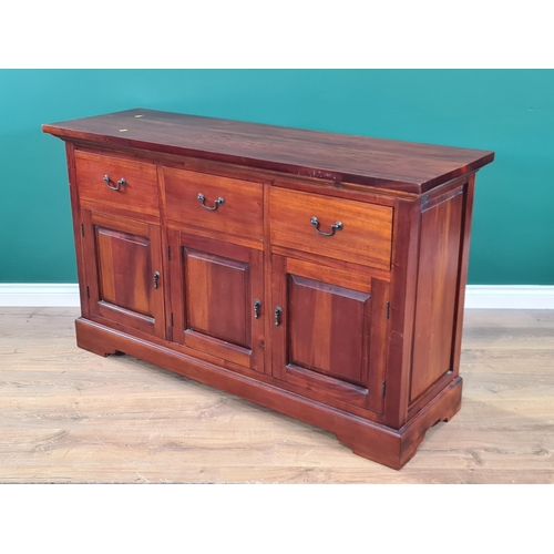 511 - A mahogany Sideboard fitted three drawers above three cupboard doors and plinth base,  4ft 8in W x 2... 