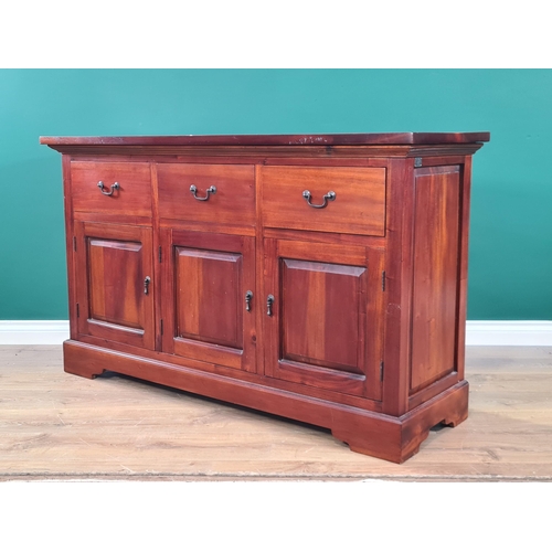 511 - A mahogany Sideboard fitted three drawers above three cupboard doors and plinth base,  4ft 8in W x 2... 