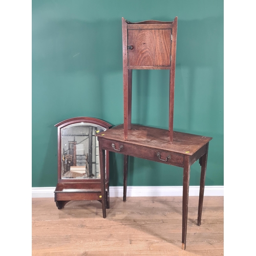 517 - A mahogany tray top Pot Cupboard with single cupboard door, raised on square supports, 2ft 9