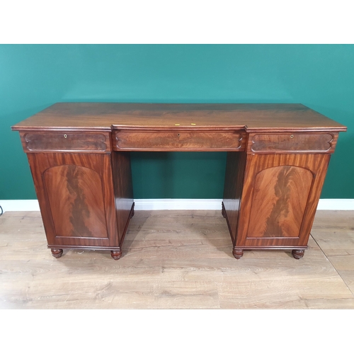 521 - A mahogany pedestal Sideboard fitted three drawers above pair of panelled cupboard doors enclosing s... 