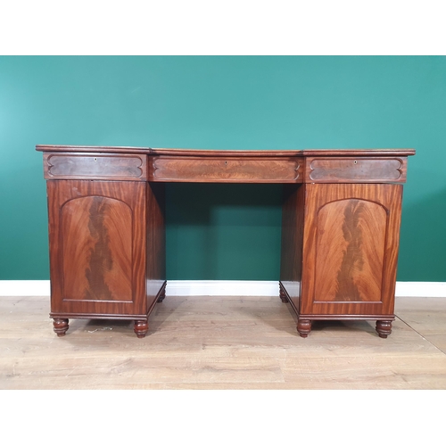 521 - A mahogany pedestal Sideboard fitted three drawers above pair of panelled cupboard doors enclosing s... 