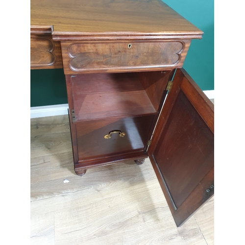 521 - A mahogany pedestal Sideboard fitted three drawers above pair of panelled cupboard doors enclosing s... 