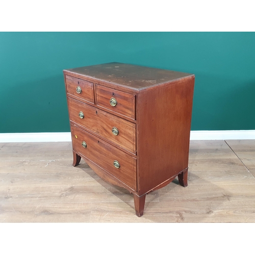 523 - A mahogany Chest of two short over long Drawers with shaped apron and splayed bracket supports, A/F,... 